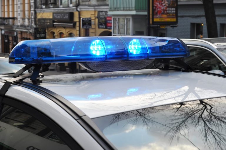 Police lights. The roof-mounted light bar of an emergency vehicle