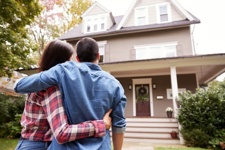 Couple looking at new house